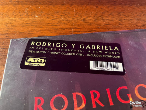 Rodrigo y Gabriela - In Between Thoughts...a New World (Bone Vinyl)