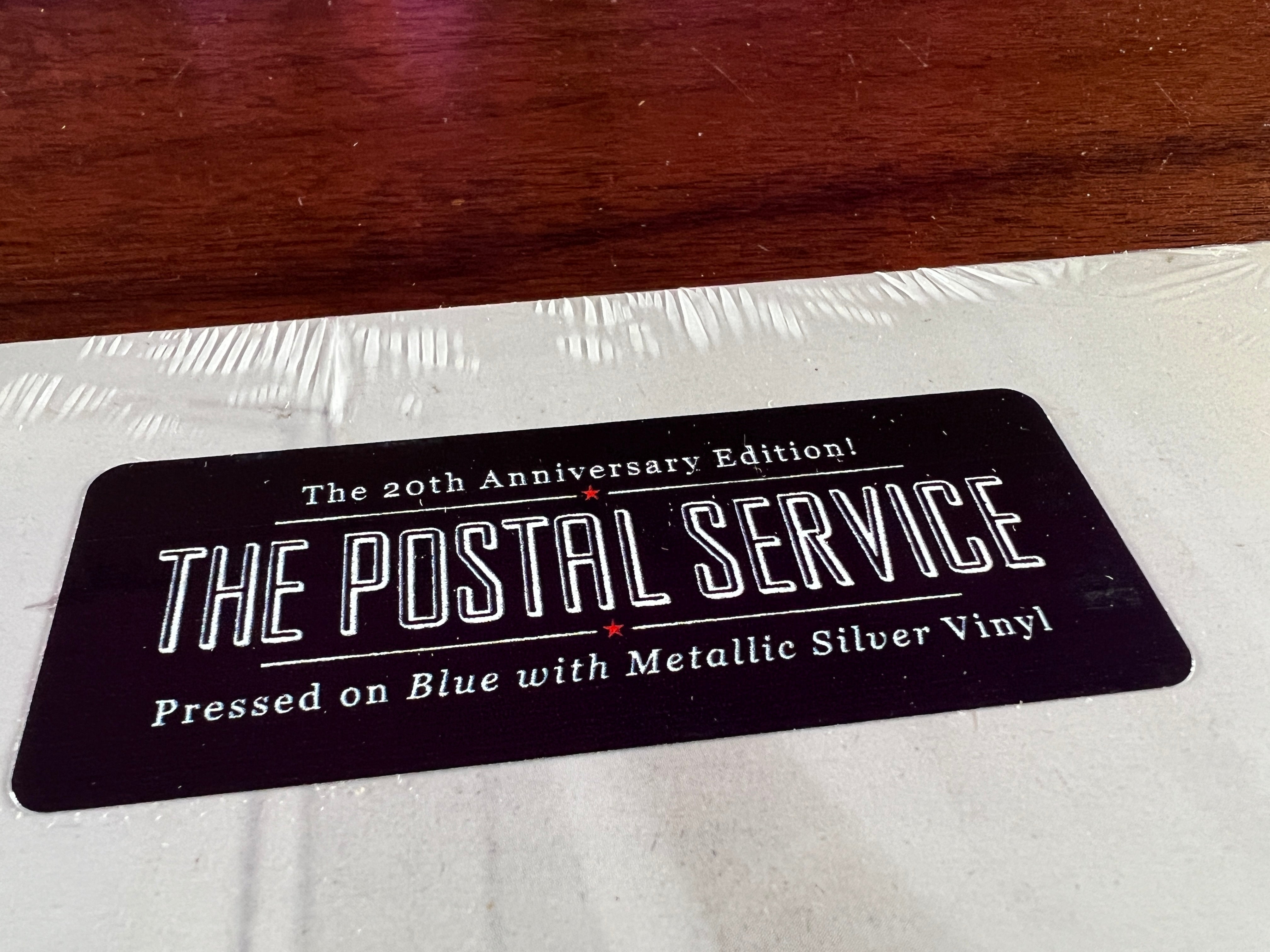 Give Up • The Postal 2024 Service • Blue Metallic Silver Colored